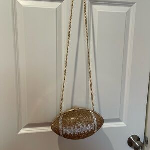 Gold and White Football Clutch with Decorative Pattern